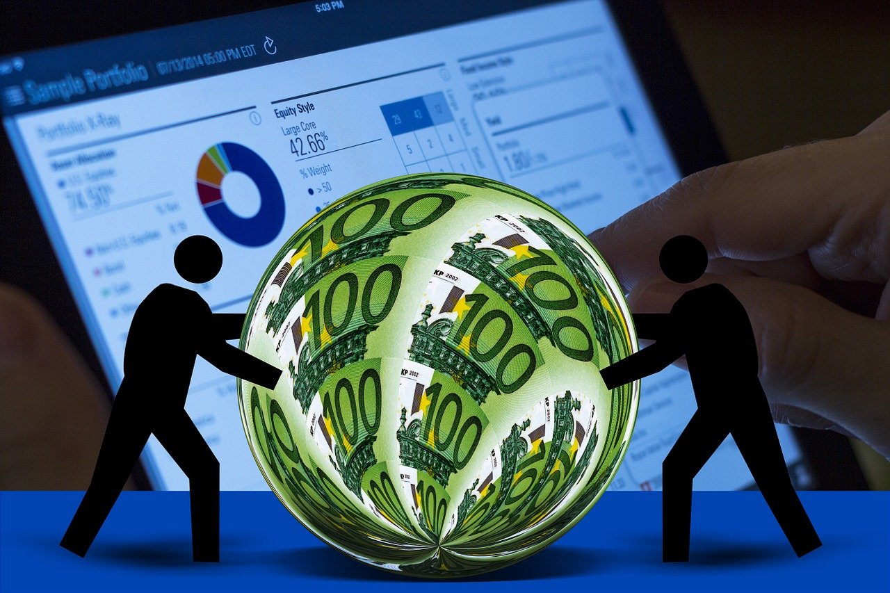 PPM Software ROI. Two stick men rolling a ball of money in front of a computer screen showing a project portfolio dashboard.